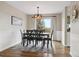 Dining room with a table and chairs, with view to the outdoor deck at 8746 Sunridge Hollow Rd, Parker, CO 80134