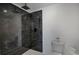 Clean bathroom with a large shower and toilet at 1131 S Raleigh St, Denver, CO 80219