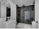 Modern bathroom with walk-in shower, floating vanity, and stylish fixtures at 1131 S Raleigh St, Denver, CO 80219