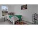 Bright bedroom with a full-size bed and Marvel themed decor at 1131 S Raleigh St, Denver, CO 80219