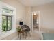 Bright bedroom with plush carpeting, natural light and a walk in closet at 616 W 1St Ave, Denver, CO 80223