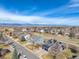 Two-story homes in a neighborhood with mountain views and solar panels at 730 Pope Dr, Erie, CO 80516