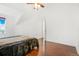 Vaulted bedroom with ceiling fan, window and hardwood floors at 9530 E Florida Ave # 2001, Denver, CO 80247