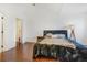 Vaulted bedroom with dark wood floors and modern decor at 9530 E Florida Ave # 2001, Denver, CO 80247