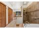 Well-appointed bathroom features a shower, bathtub, vanity, and convenient access to the bedroom at 72 Overlook Ct, Idaho Springs, CO 80452