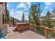 Mountain views from the deck with a hot tub at 72 Overlook Ct, Idaho Springs, CO 80452