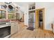 Bright kitchen features stainless steel refrigerator and a pantry at 72 Overlook Ct, Idaho Springs, CO 80452