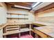 Basement featuring workbench and shelving, ideal for projects and storage at 12879 E Oregon Dr, Aurora, CO 80012