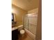Bathroom with a shower-tub combo and a vanity with ample storage space at 12879 E Oregon Dr, Aurora, CO 80012
