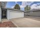 Exterior shot of a two-car garage, providing convenient parking and storage space at 12879 E Oregon Dr, Aurora, CO 80012