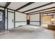 Bright living room with beamed ceilings and carpet floors at 12879 E Oregon Dr, Aurora, CO 80012