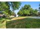 Expansive backyard with a lush lawn, storage shed, and room for outdoor activities, perfect for Gathering gatherings at 8140 Pennsylvania Way, Denver, CO 80229