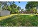 Large backyard featuring a storage shed, mature trees, and potential for gardening and outdoor enjoyment at 8140 Pennsylvania Way, Denver, CO 80229