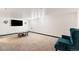 Spacious finished basement with plush carpeting, perfect for entertaining or relaxing in a comfortable setting at 8140 Pennsylvania Way, Denver, CO 80229