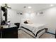 Bright bedroom featuring neutral walls, carpet floors, and a makeup vanity with great lighting at 8140 Pennsylvania Way, Denver, CO 80229