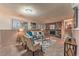 Cozy basement living area with a stone fireplace and comfortable seating at 1583 Skeel St, Brighton, CO 80601