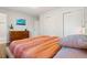 Bedroom with ample storage, light walls and comfortable bedding at 5525 E Bails Dr, Denver, CO 80222