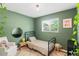 Bedroom with unique plants, decor and natural light at 5525 E Bails Dr, Denver, CO 80222