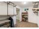 Organized walk-in closet with custom shelving, storage, and clothing racks at 5525 E Bails Dr, Denver, CO 80222