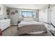Bright bedroom featuring a comfortable bed and city views at 550 E 12Th Ave # 509, Denver, CO 80203