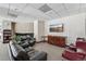 Relaxing community room with leather seating and TV at 550 E 12Th Ave # 509, Denver, CO 80203