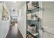 Bright hallway with built-in shelving for storage at 550 E 12Th Ave # 509, Denver, CO 80203