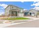 Inviting two-story home showcasing professional landscaping, a two-car garage, and charming neighborhood setting at 2206 Crosswind St, Fort Lupton, CO 80621