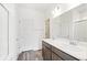 Modern bathroom with double vanity and a separate shower at 13412 E 110Th Way, Commerce City, CO 80022