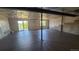 Unfinished basement with concrete floor, vapor barrier, and egress windows at 1653 Valley Oak Ct, Castle Rock, CO 80104