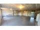 Spacious unfinished basement with concrete walls, vapor barrier, and overhead lighting at 1653 Valley Oak Ct, Castle Rock, CO 80104