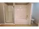Bathroom featuring a glass shower and tile surround bathtub with shower at 1653 Valley Oak Ct, Castle Rock, CO 80104