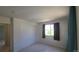 Bright carpeted bedroom with window and closet, offering comfort and function at 1653 Valley Oak Ct, Castle Rock, CO 80104