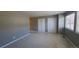 Carpeted bedroom featuring natural light from the window, and storage space at 1653 Valley Oak Ct, Castle Rock, CO 80104