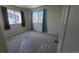 Well-lit bedroom with carpeted floors and natural light from dual windows at 1653 Valley Oak Ct, Castle Rock, CO 80104