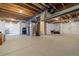 Unfinished basement area with exposed ceiling, perfect for customization and storage or future living space at 16341 Clayton St, Thornton, CO 80602
