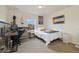 Comfortable bedroom featuring a twin bed, a desk, and a window with natural light at 16341 Clayton St, Thornton, CO 80602