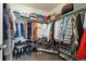 Walk-in closet featuring ample storage space with clothing racks, shelving, and shoe organizers at 16341 Clayton St, Thornton, CO 80602