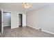 Neutral bedroom with gray walls and flooring, showing a walk in closet and creating a calming and serene atmosphere at 384 S Decatur St, Denver, CO 80219