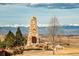 Community landmark with mountains in the background on a sunny day at 16370 Graham Peak Way, Broomfield, CO 80023