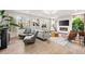 Cozy living area with large windows, natural light, and stylish furnishings at 16370 Graham Peak Way, Broomfield, CO 80023