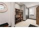 Mud room with custom shelving and storage for shoes and personal items at 16370 Graham Peak Way, Broomfield, CO 80023