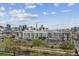 Daytime aerial view of residential and commercial buildings at 1301 Speer Blvd # 1108, Denver, CO 80204