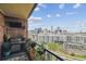 Balcony with city views, grill, and plants at 1301 Speer Blvd # 1108, Denver, CO 80204