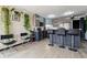 Modern kitchen with stainless steel appliances, breakfast bar, contemporary cabinets, and natural light in an urban setting at 1301 Speer Blvd # 1108, Denver, CO 80204