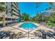Relaxing pool and sunbathing area with plenty of lounge chairs at 1301 Speer Blvd # 1108, Denver, CO 80204