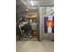 View of a filled storage unit with bike and Colorado flag at 1301 Speer Blvd # 1108, Denver, CO 80204