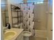 Bathroom with an Eiffel Tower shower curtain at 21561 E 48Th Pl, Denver, CO 80249