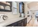 Modern kitchen featuring two-tone cabinets, quartz countertops, and stainless steel appliances at 11013 Valleybrook Cir, Highlands Ranch, CO 80130