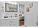 Modern bathroom with white vanity and stylish mirror at 7746 S Gray St, Littleton, CO 80128