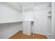 Walk-in closet with built-in shelves and drawers at 4629 Estes St, Wheat Ridge, CO 80033